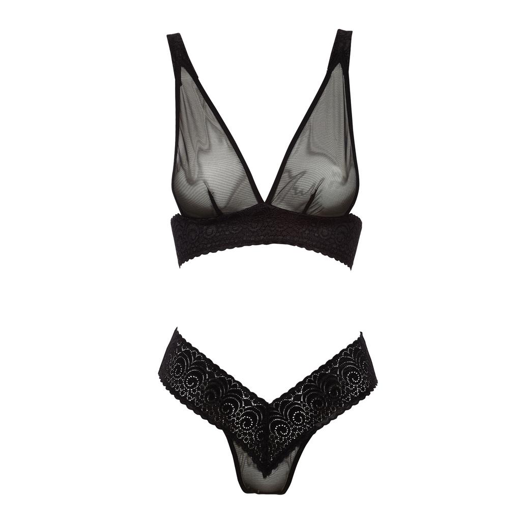 Always A Muse Sheer Lace Thong (front view) show in black with see-through panels on front and ultra-low rise. Shown here with Always A Muse Convertible Plunge Bralette.